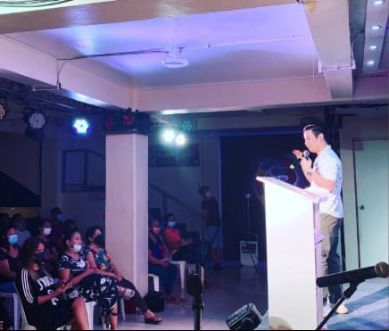 Myles Tan at a speaking or ministry event